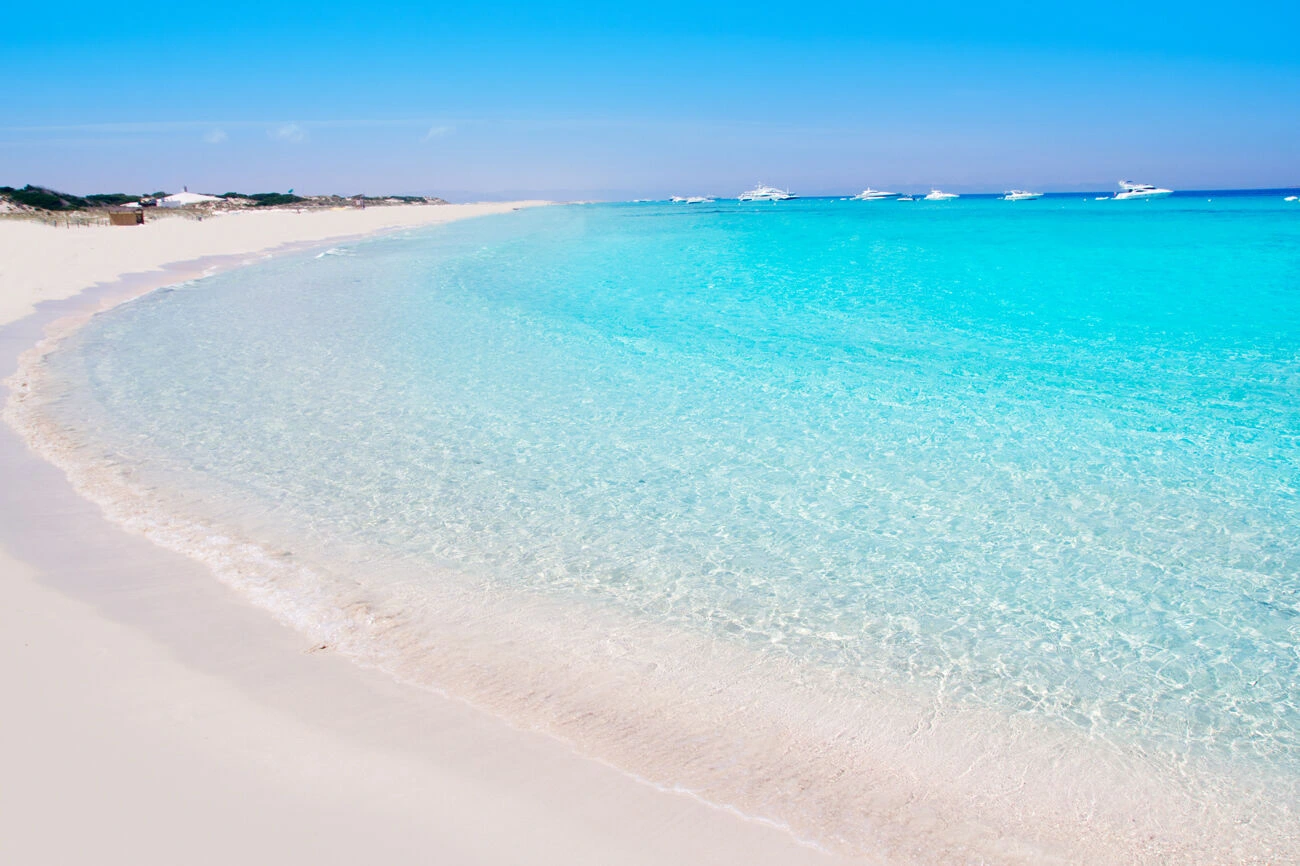Ses Illetes Beach on a boat route from Ibiza